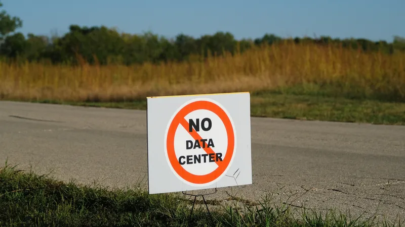Teacher arrested for clapping in support of opposition at an AI data center meeting β gigawatt-scale project gets approved anyway despite community resistance